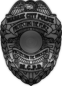 Badge carried by MCPD officers